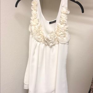 Cream tank with rosettes